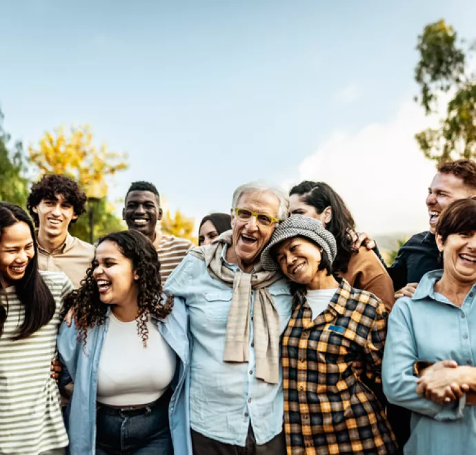 happy group of diverse people outside